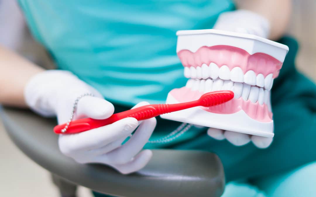 Right technique of cleaning teeth performed by professional dentist