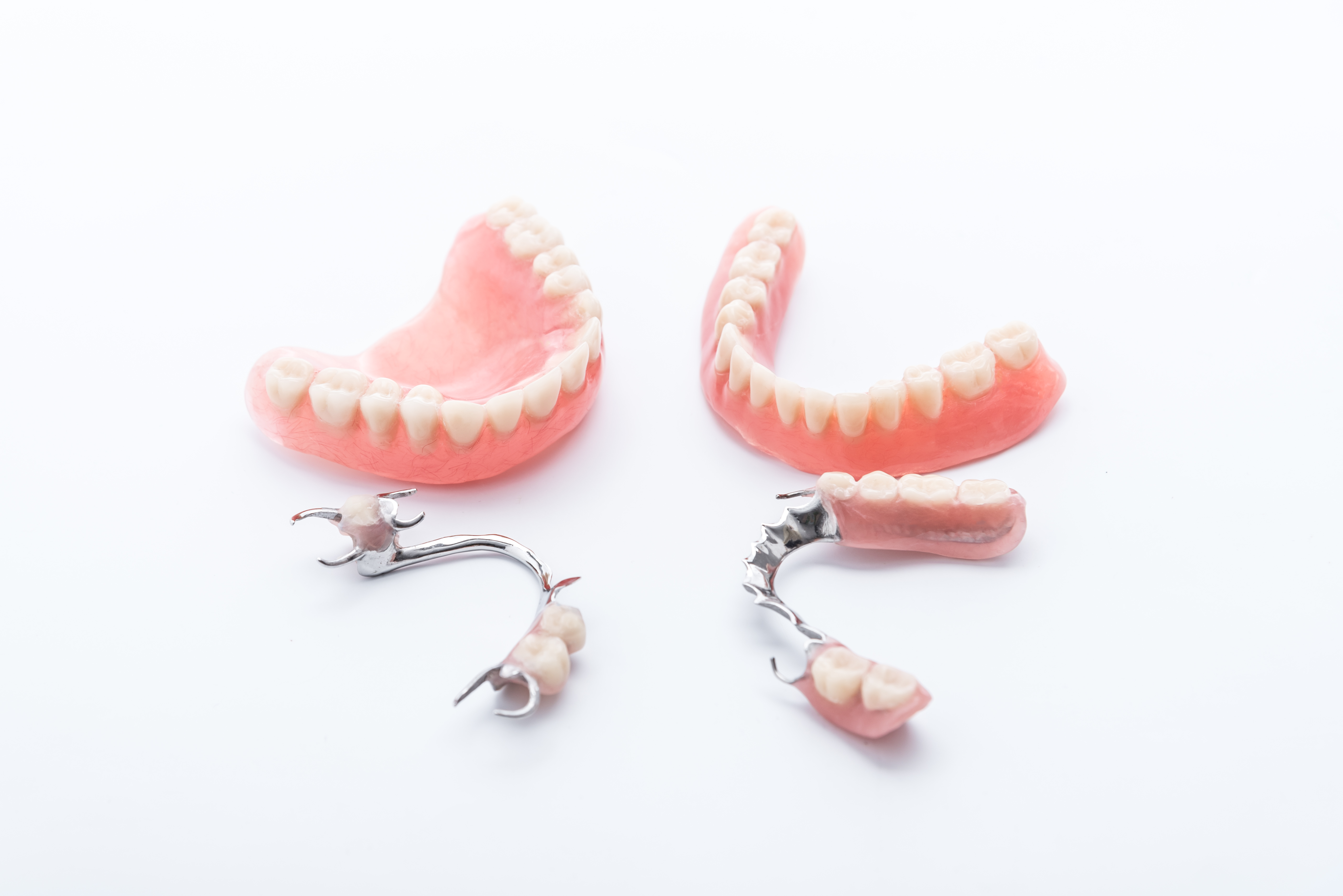 Set of dentures on white background 542703718